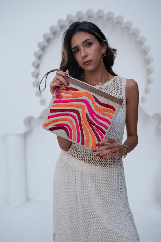 A bold blend of orange, burgundy, and fuchsia.