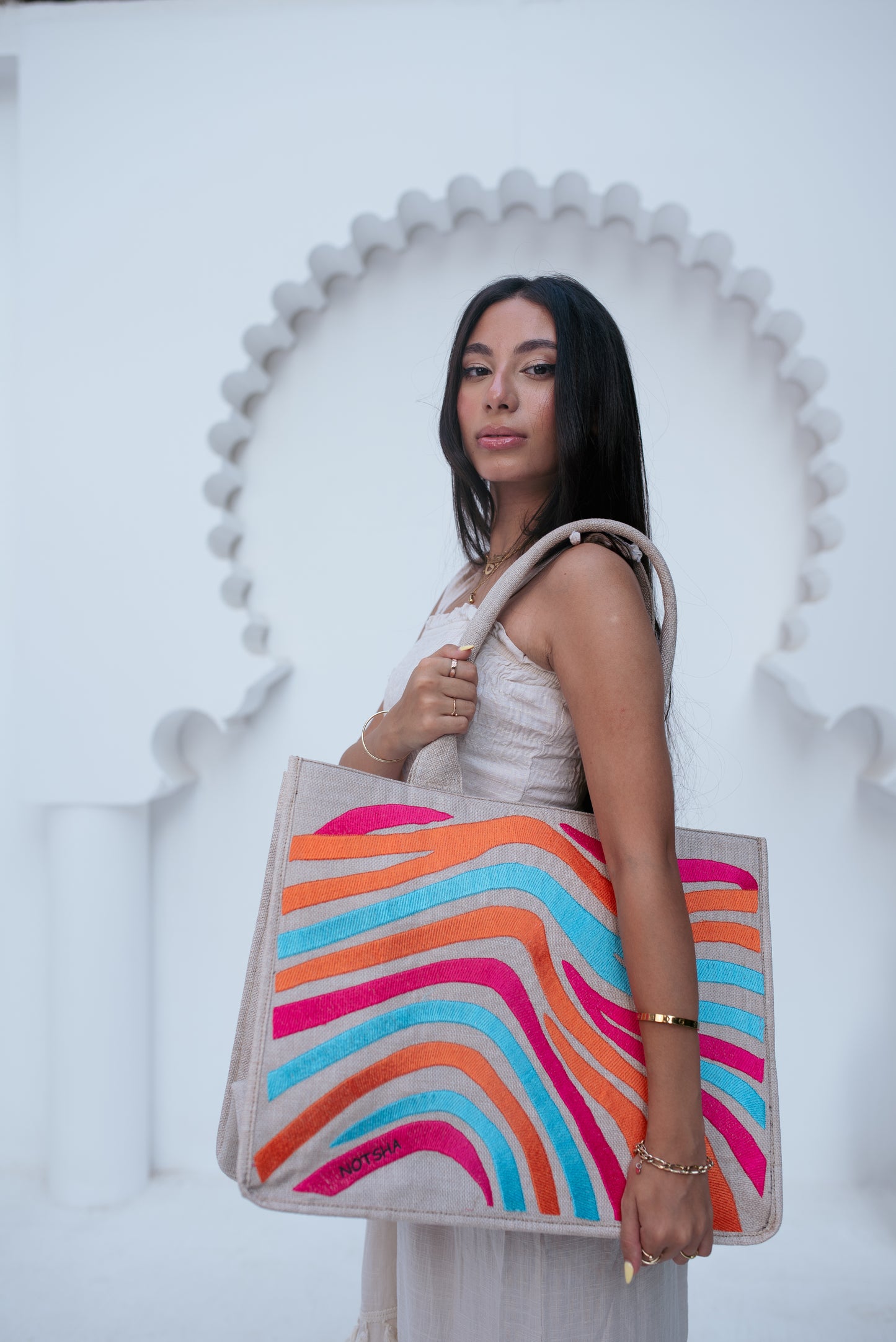 A vibrant blend of turquoise, orange, and fuchsia.