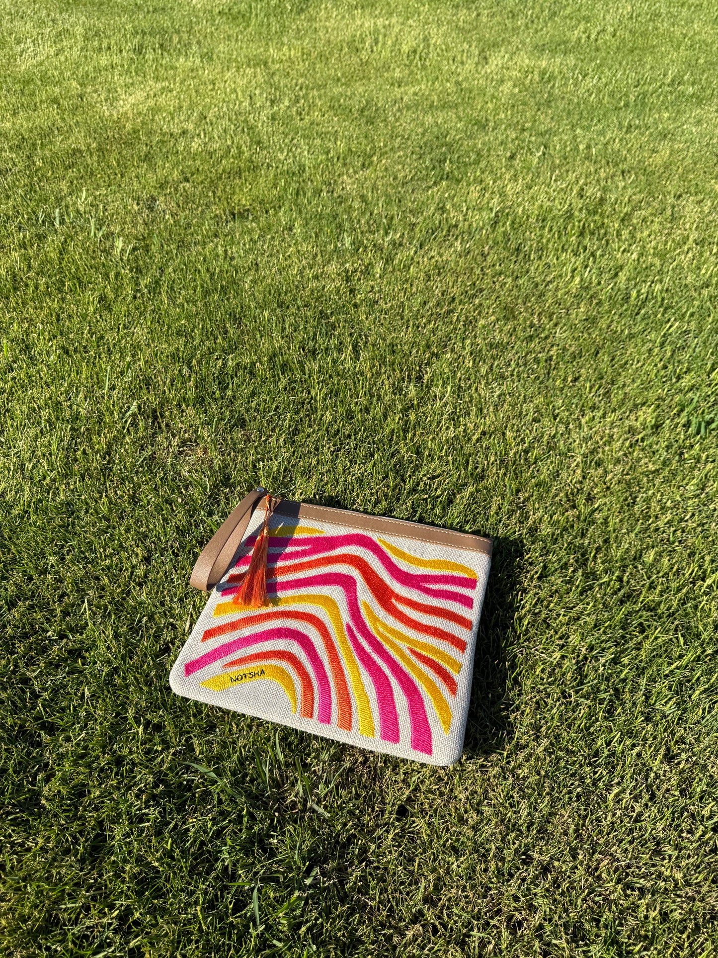 A vibrant mix of orange, fuchsia, and yellow.