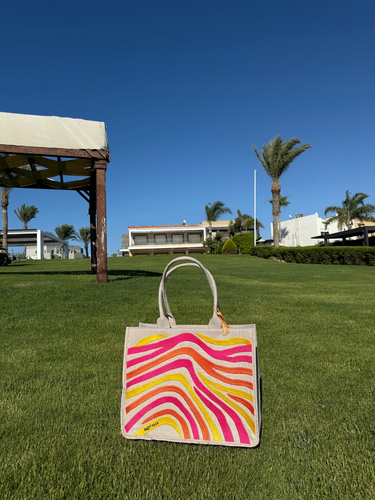 A vibrant mix of orange, fuchsia, and yellow.